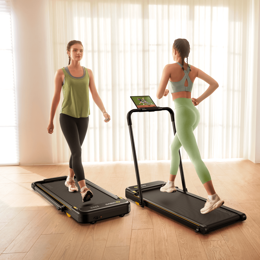 Two women use the UREVO Strol 2E Smart Treadmill for walking and running, highlighting its versatile workout options.